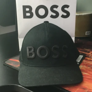 Boss keps - Bra skick får med tag och påse!