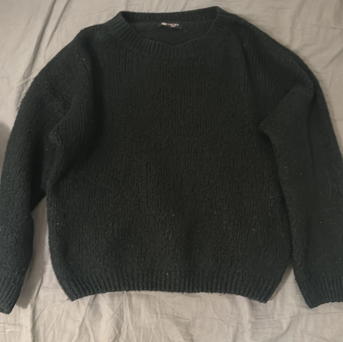 Svart stickad tröja med rund hals Chelsea - 1