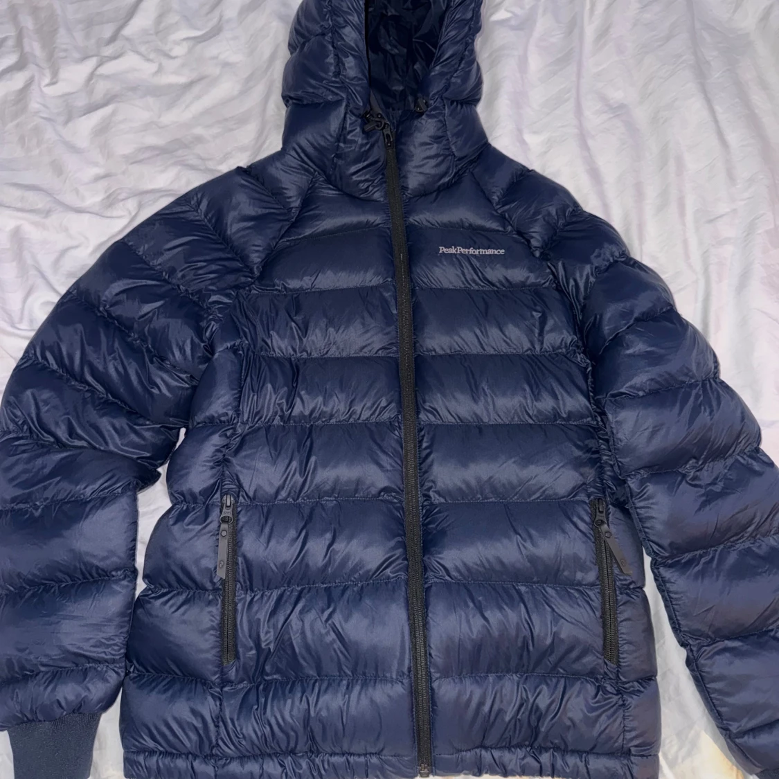 Mörkblå dunjacka Peak Performance