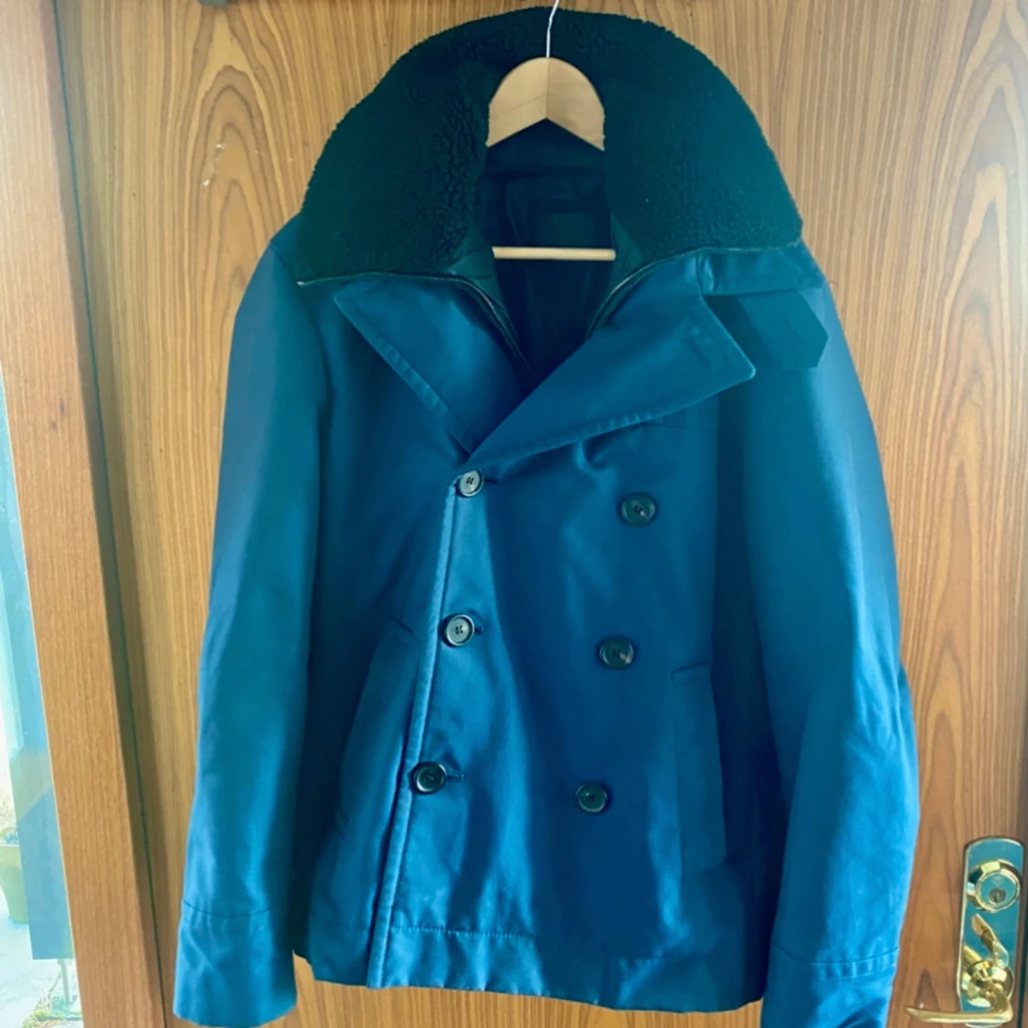 Blå skepparkavaj från Prada