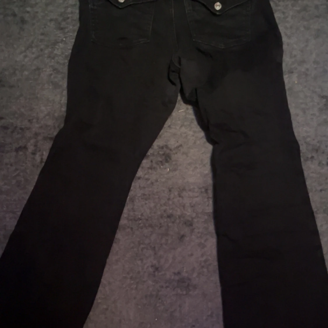 Svarta bootcut jeans med fickor