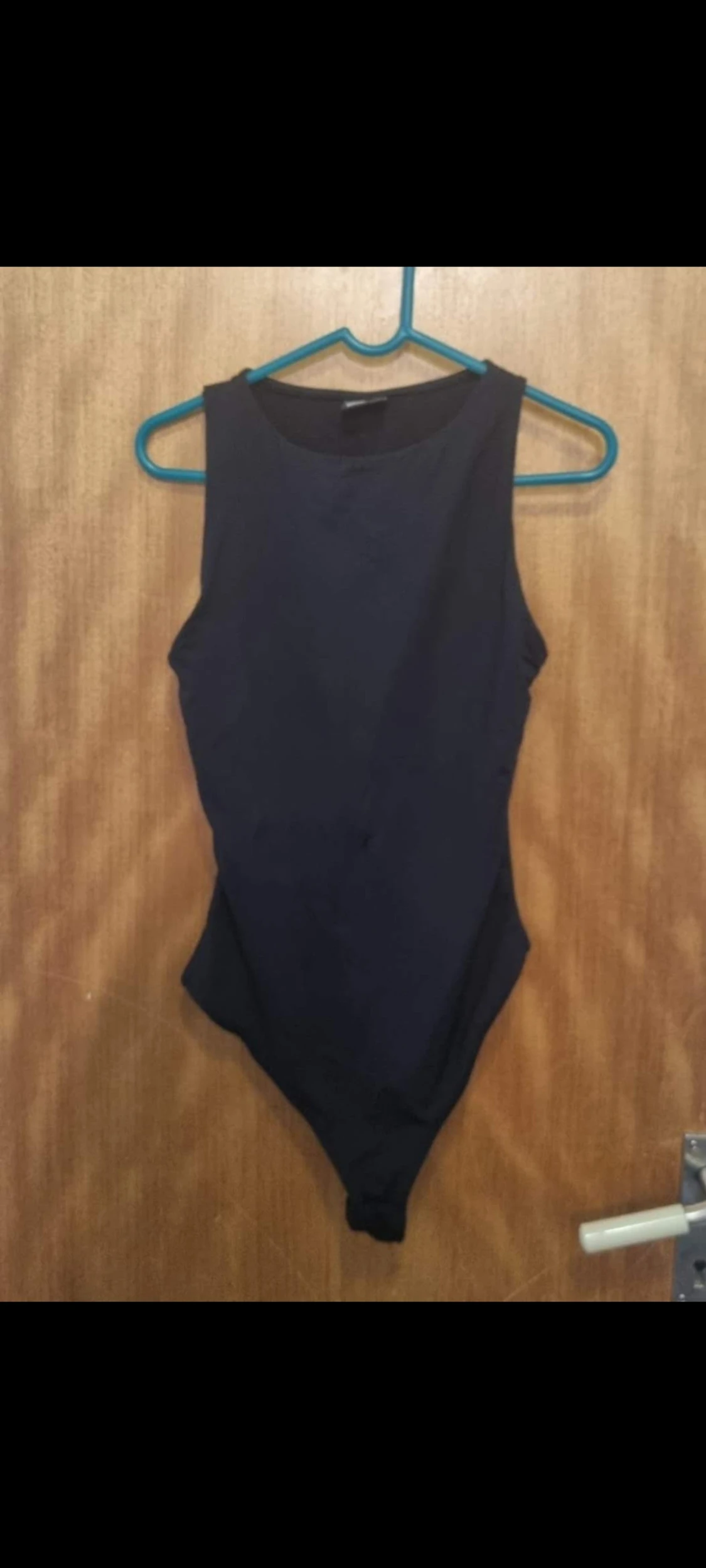 Svart ärmlös bodysuit