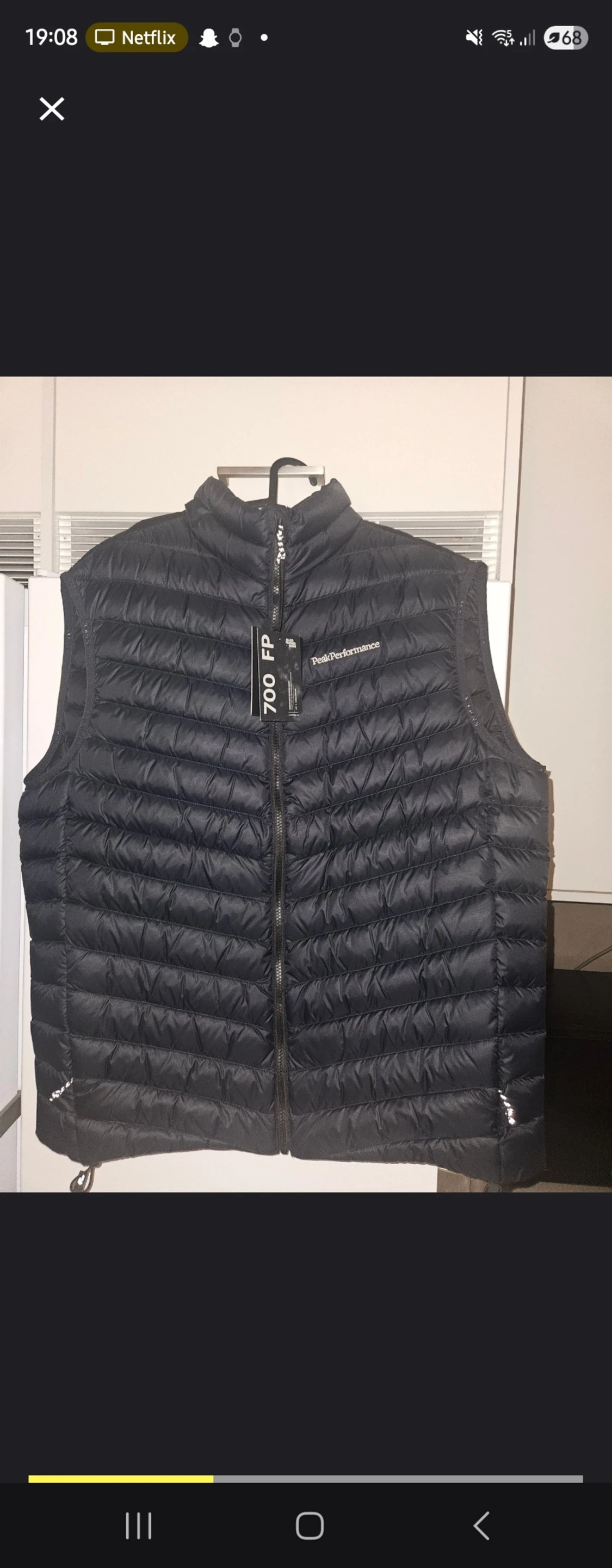 Svart dunväst från Peak Performance