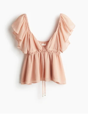 Ljusrosa volangblus från H&M strl S - Aldrig använt,  bara provade en gång 