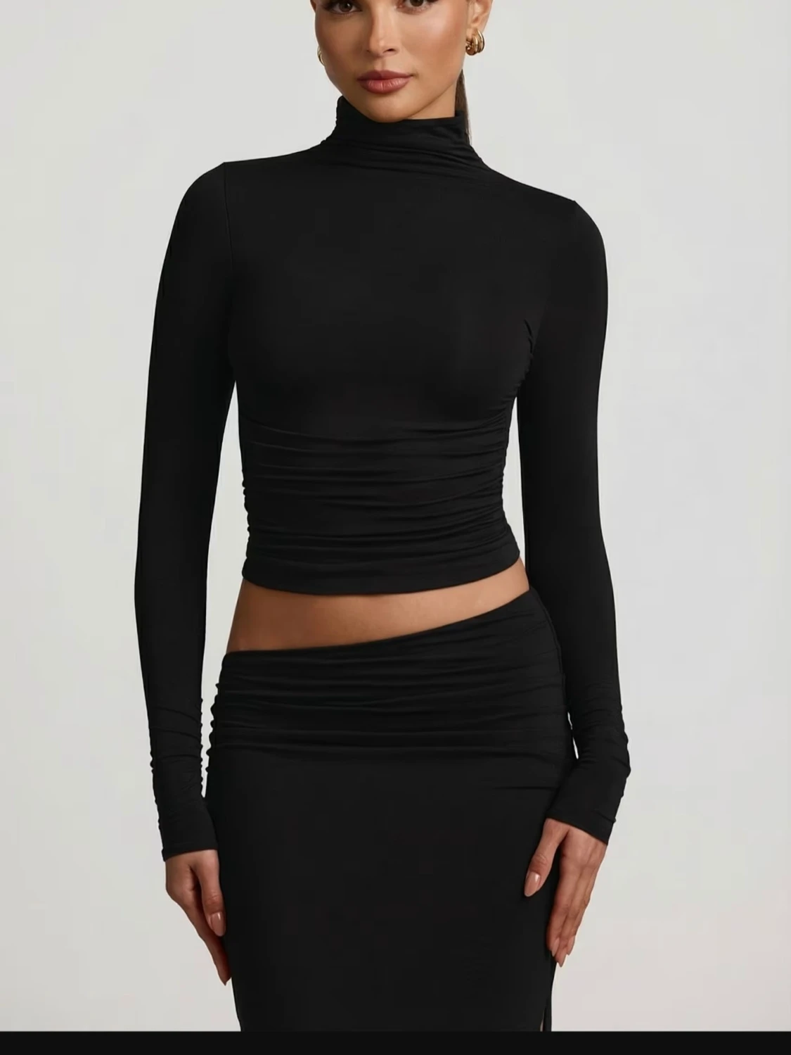 Svart polotopp med öppen rygg från Auri - 3