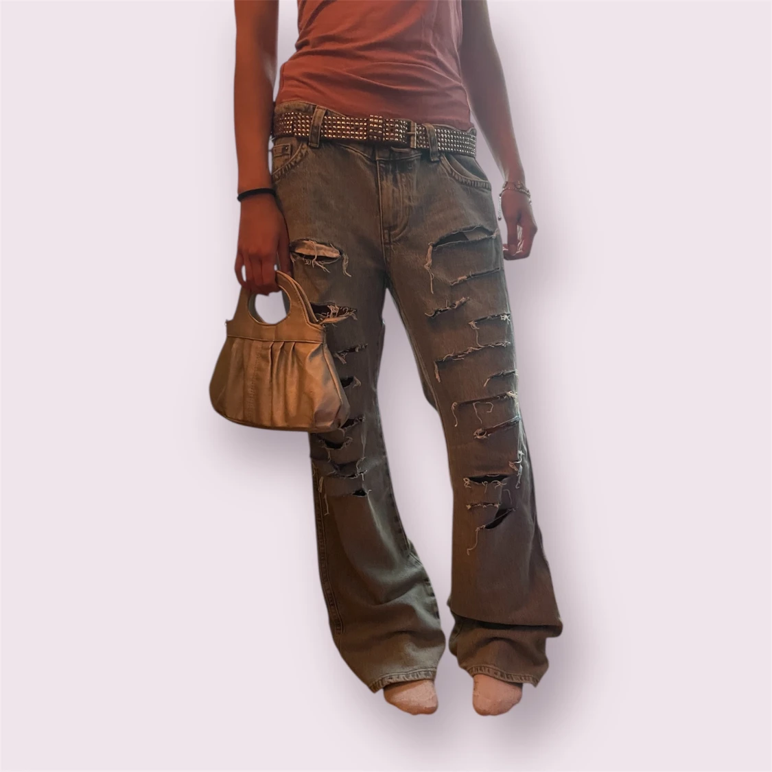 Ljusblå baggy jeans med slitningar