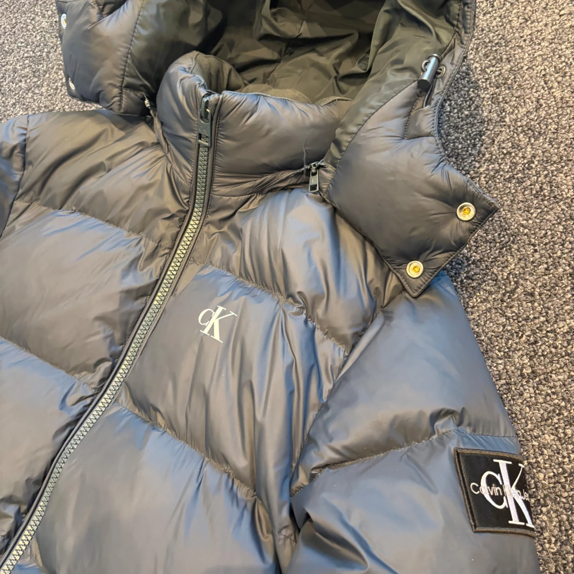 Blå pufferjacka från Calvin Klein - 1
