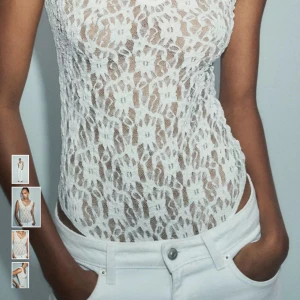 Vit spetsbody från Zara - Säljer en snygg vit body i spets från Zara.                        Stl L.                                                                                    Ny med prislapp, aldrog använd.                                           Slutsåld.