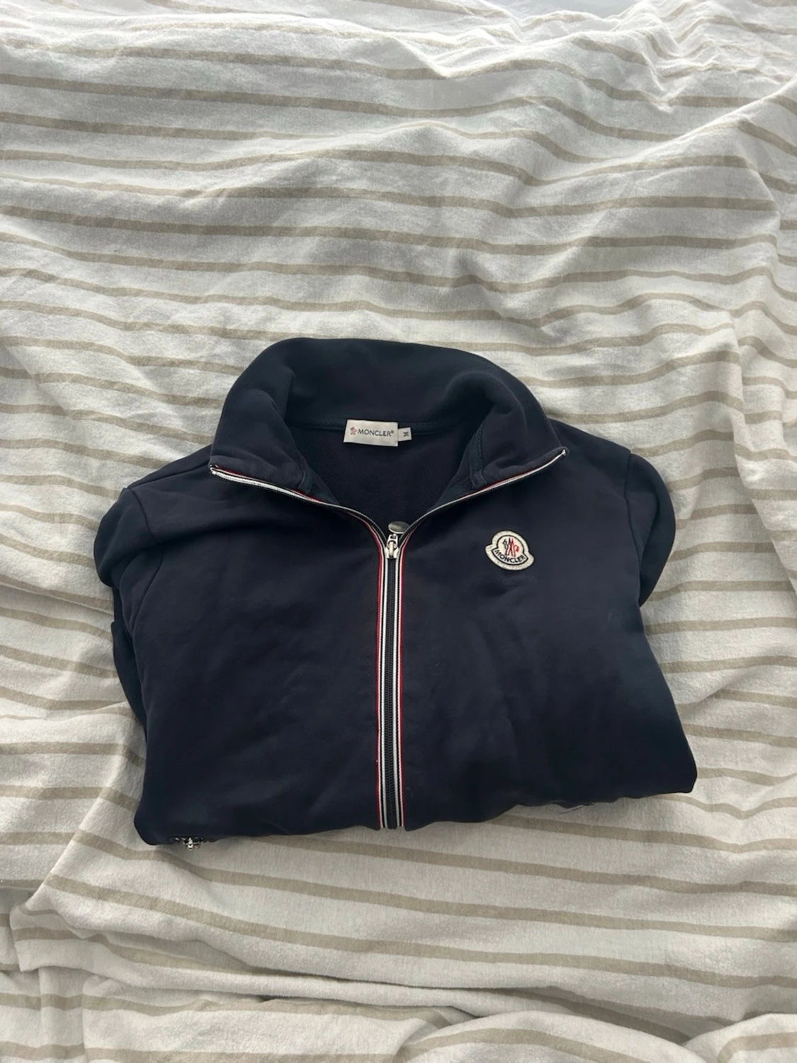 Marinblå ziptröja från Moncler