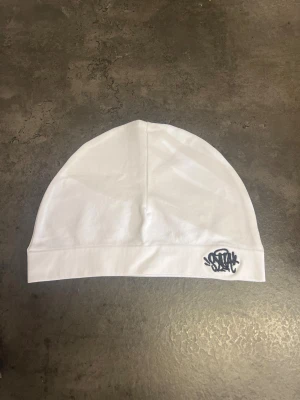 vit syna world mössa - White syna world skull hatt / aldrig använd \           \ one size / 