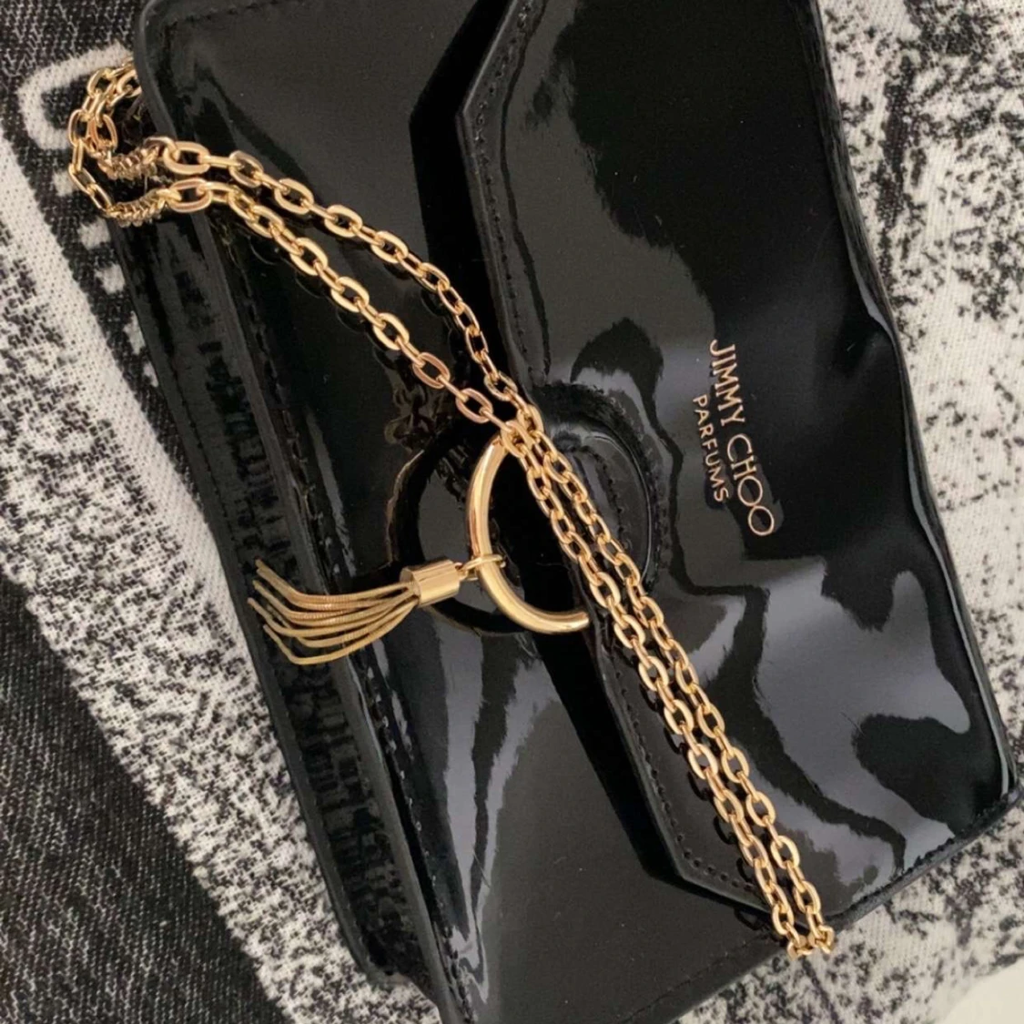 Svart lackad kuvertväska Jimmy Choo