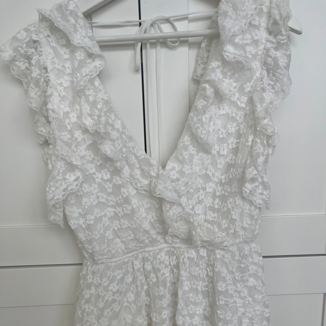 Vit spetsklänning från Nelly M