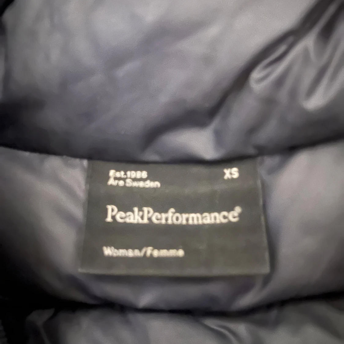 Svart dunjacka Peak Performance XS - 1