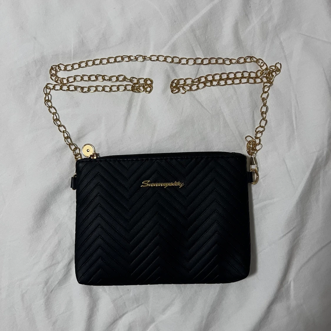 Svart quiltad axelväska