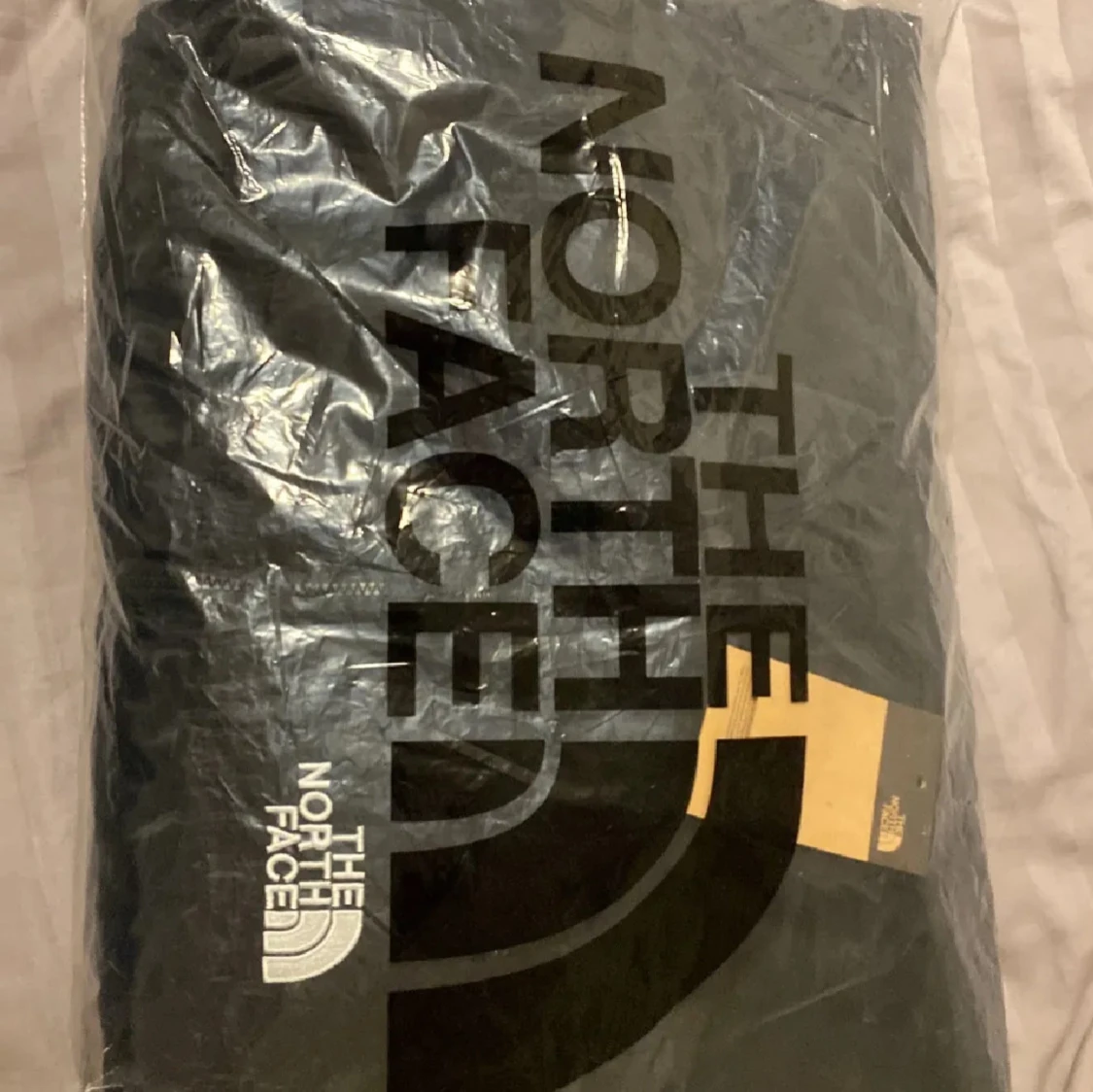 Svart dunväst från The North Face - 2