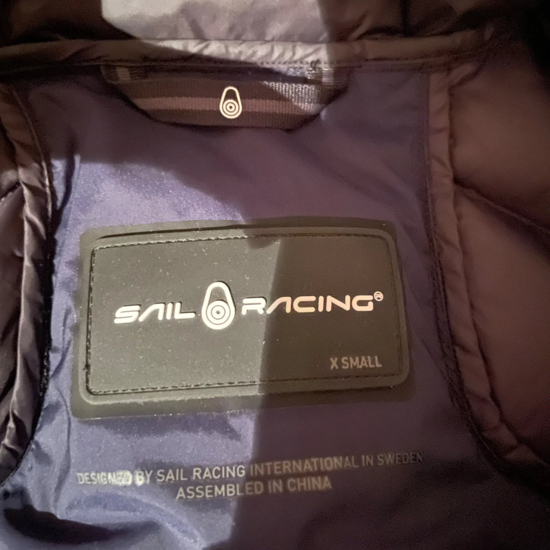 Blå dunväst från Sail Racing XS - 1