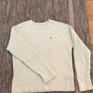 Mint Tommy Hilfiger Sweater - Stylish mint knit sweater from Tommy Hilfiger with a discreet logo on the chest. Size S, 100% cotton. Very good condition, seldom wear, looks new! Perfect for layering and a clean look.💕 