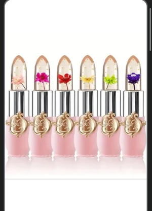 Magiska läppstift med blommor - Säljer sex unika läppstift med transparent topp och inbäddade blommor i olika färger: rosa, fuchsia, röd, gul, grön och lila. Hylsan är lyxigt rosa med gulddetaljer och silvrig finish. Perfekt för dig som vill ha något extra och instagramvänligt i sminkväskan.