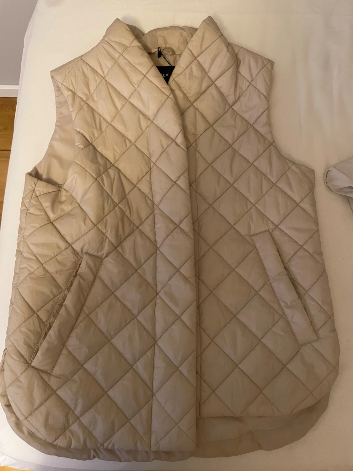 Beige dunväst från Lindex - 2