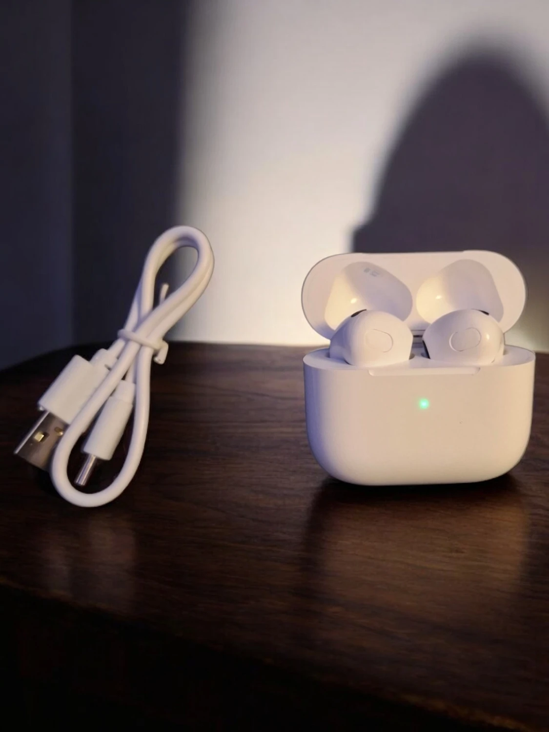 Trådlösa hörlurar med laddningsetui