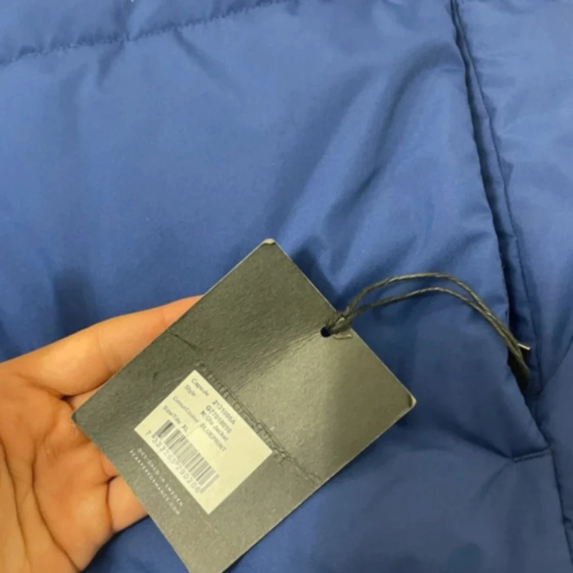 Blå pufferjacka Peak Performance - 3