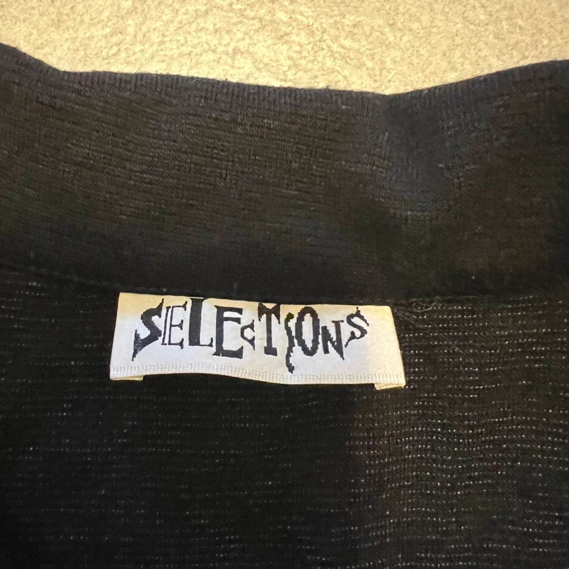 Svart zip-kofta från Selections - 2