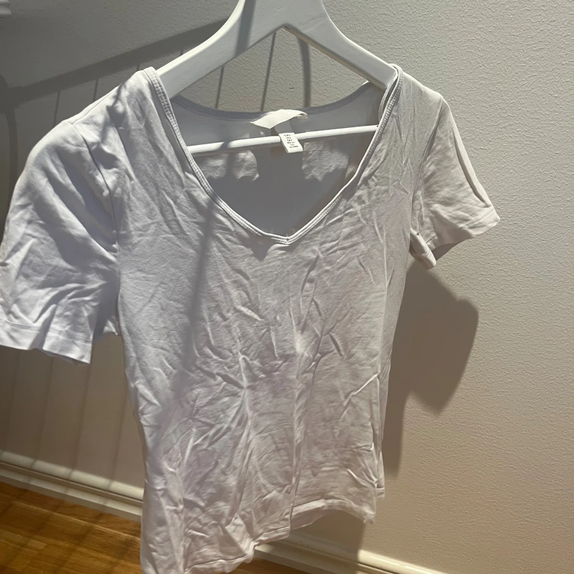 Vit v-ringad topp från H&M - 1