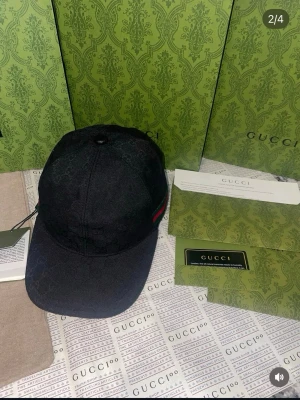 GG keps  - Jättefin keps med den svara färgen allt ingår med den oanvänd 