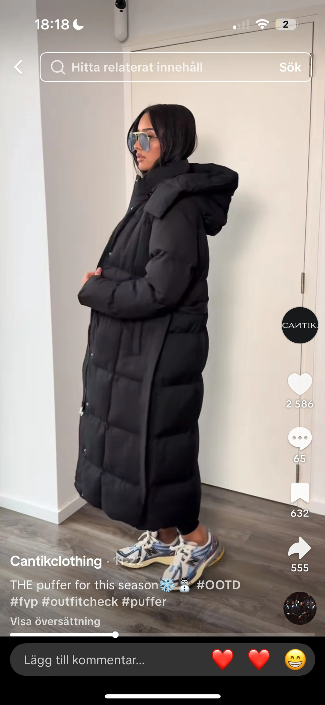 Svart lång pufferjacka med huva - 1