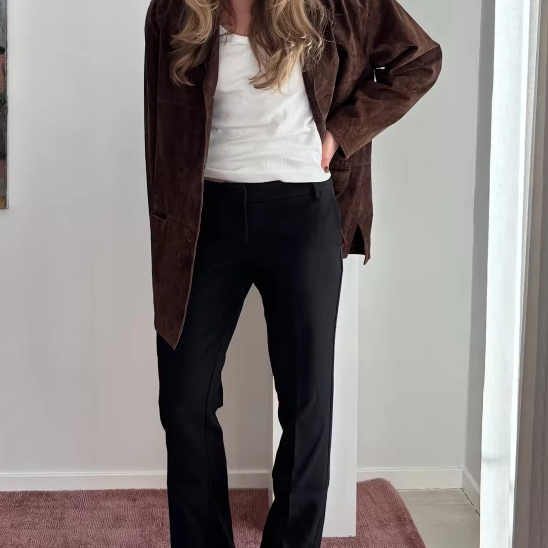 Svarta kostymbyxor