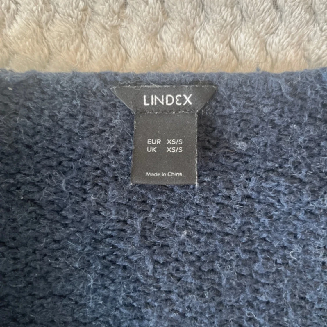 Mörkblå stickad kofta - 1