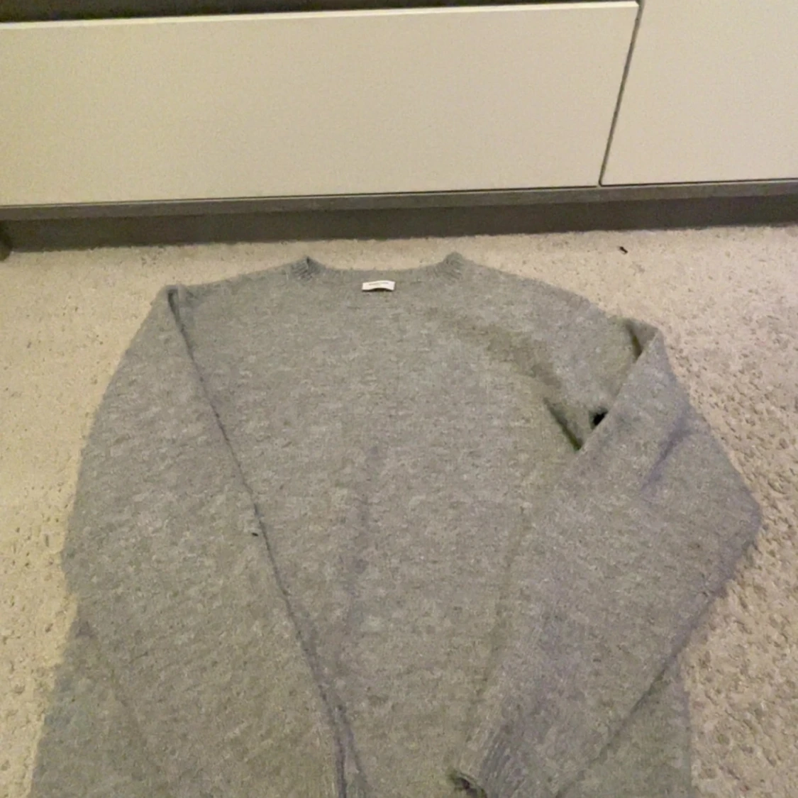 Grå stickad tröja från Kappahl