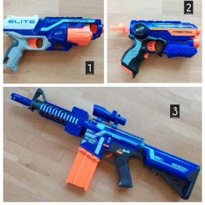 Den här bilden visar fem olika Nerf-leksaksvapen - Samlingen innehåller fem coola Nerf-blasters i olika modeller och färger – perfekt för actionfyllda Nerf-battles med vänner! Passar dig som gillar lek, tävling och att samla på unika leksaksvapen. Gör dig redo för nästa Nerf-strid!