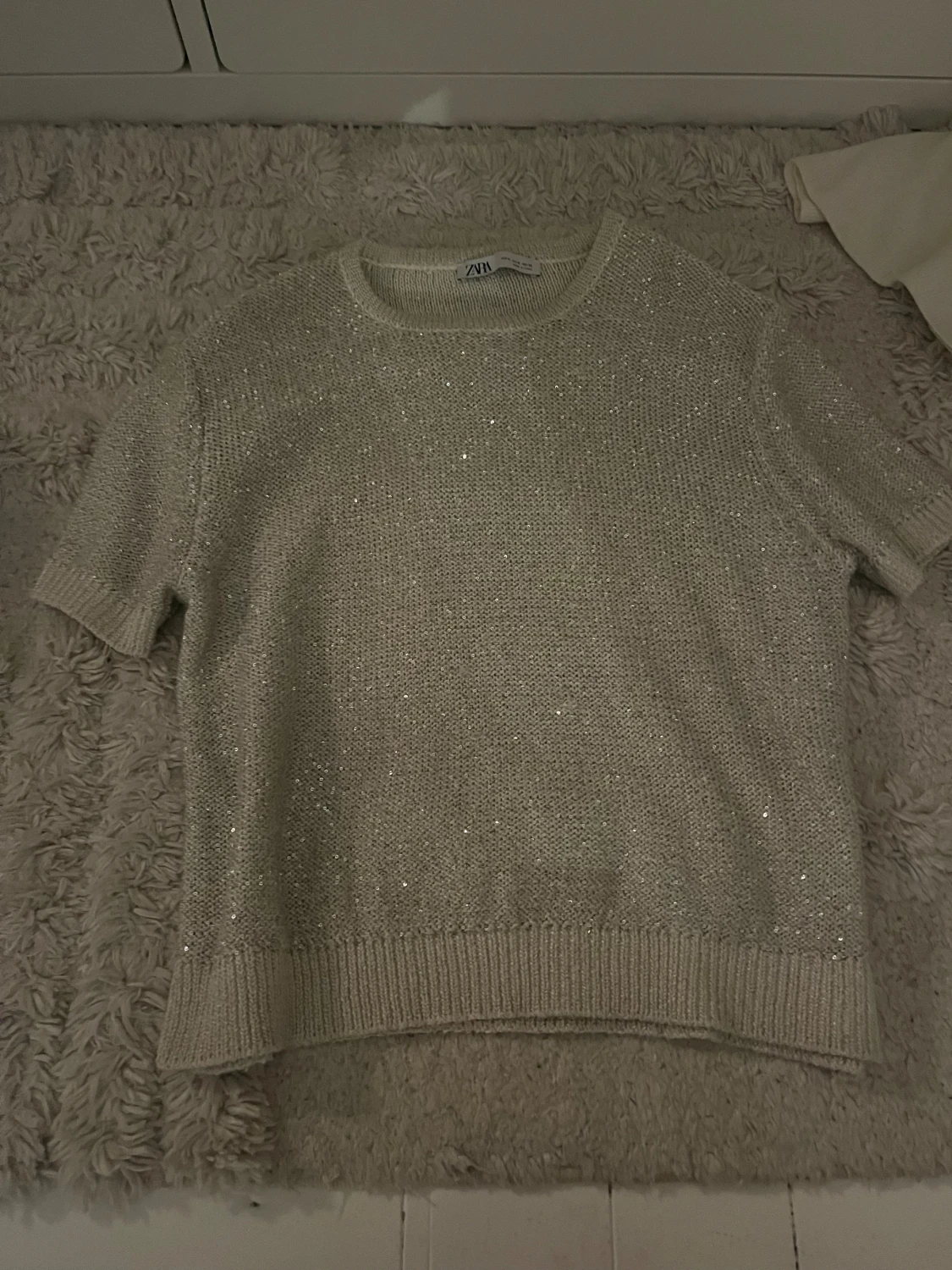 Glittrig topp Zara