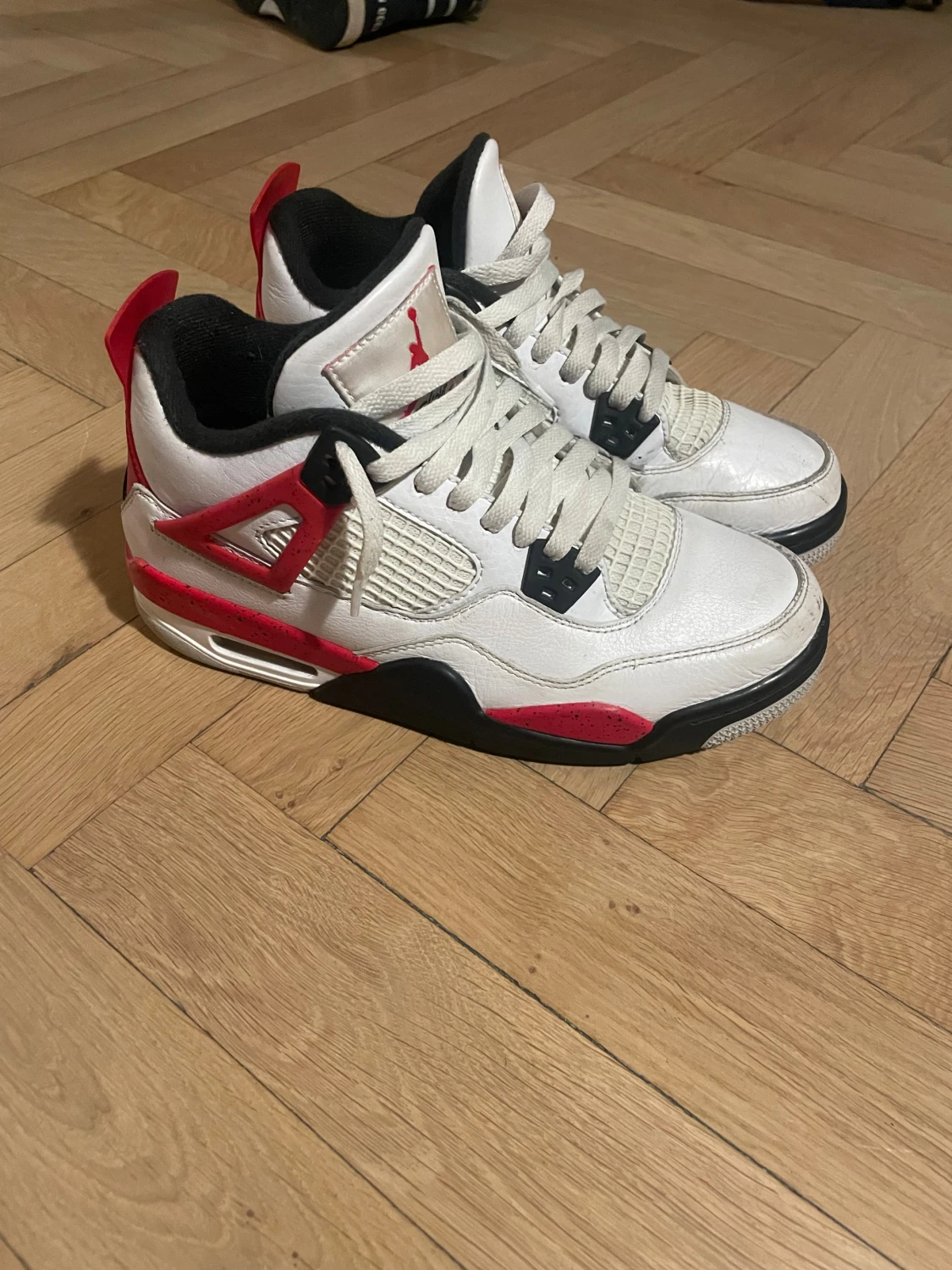 Jordan 4 Red cement