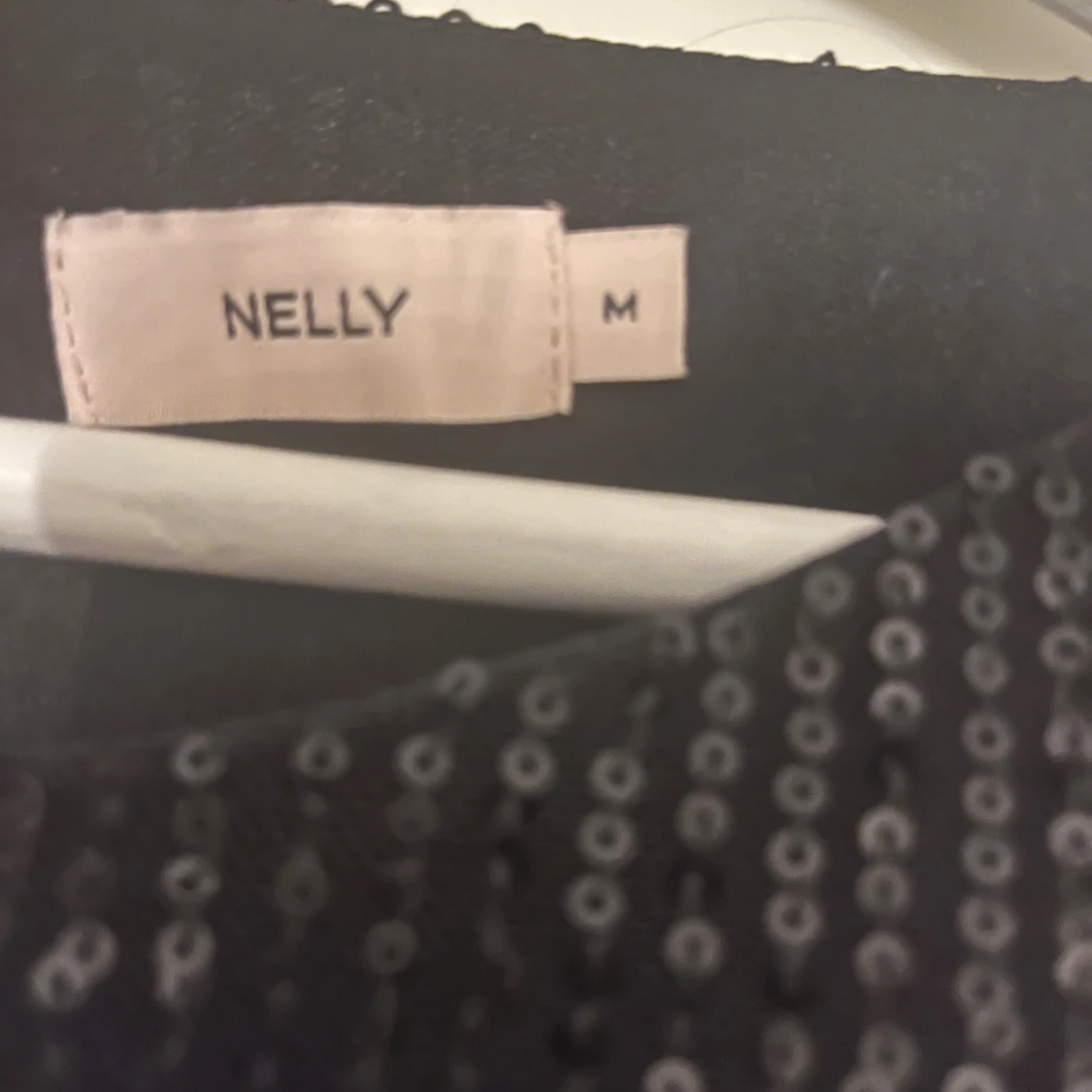 Svart glittrig kortklänning från Nelly - 3