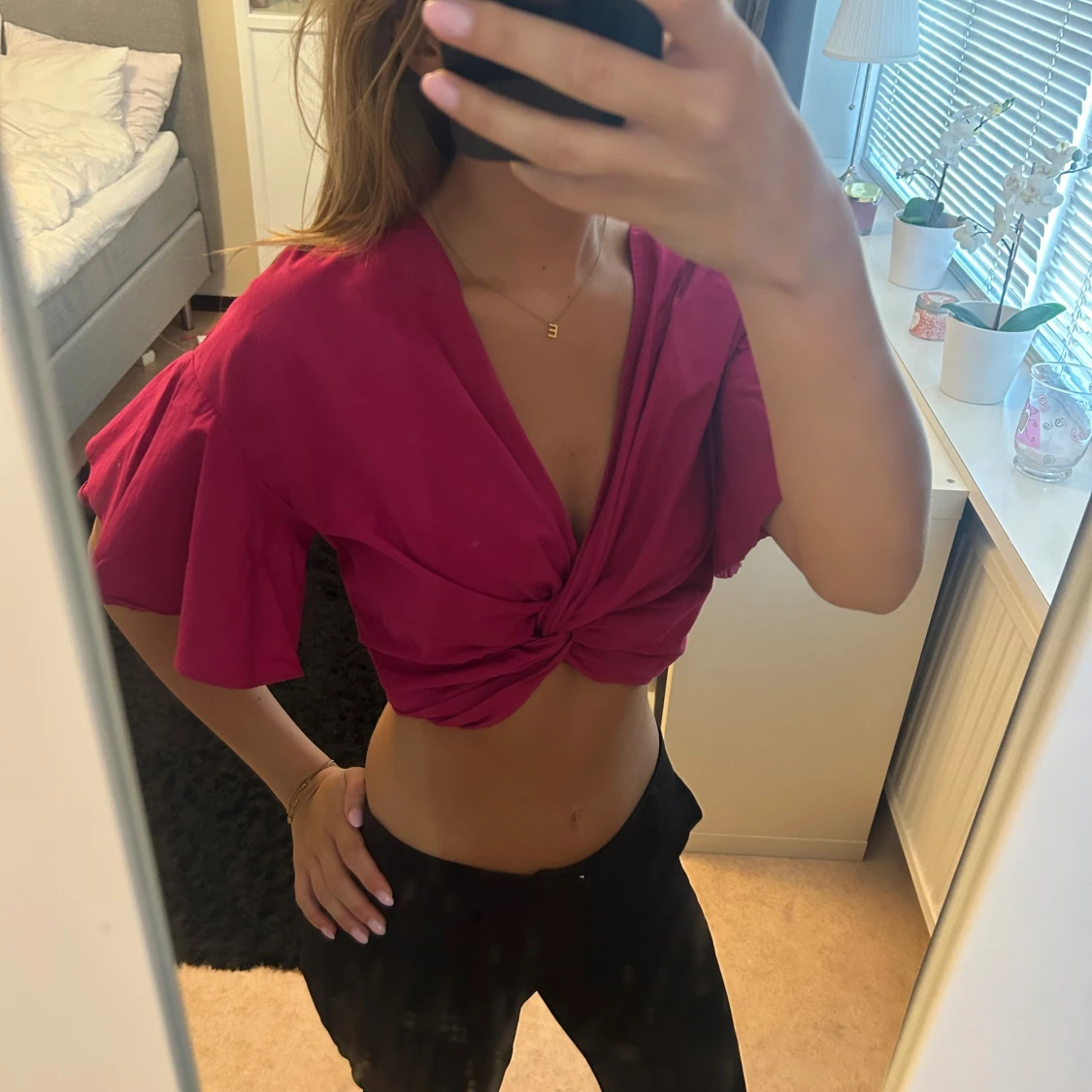 Rosa croppad omlottopp med knut