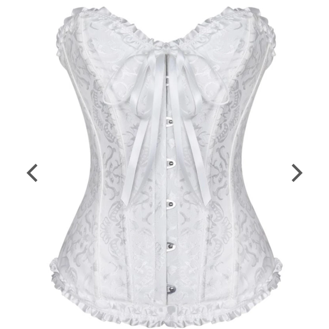 Vit korsett med rosett och spets