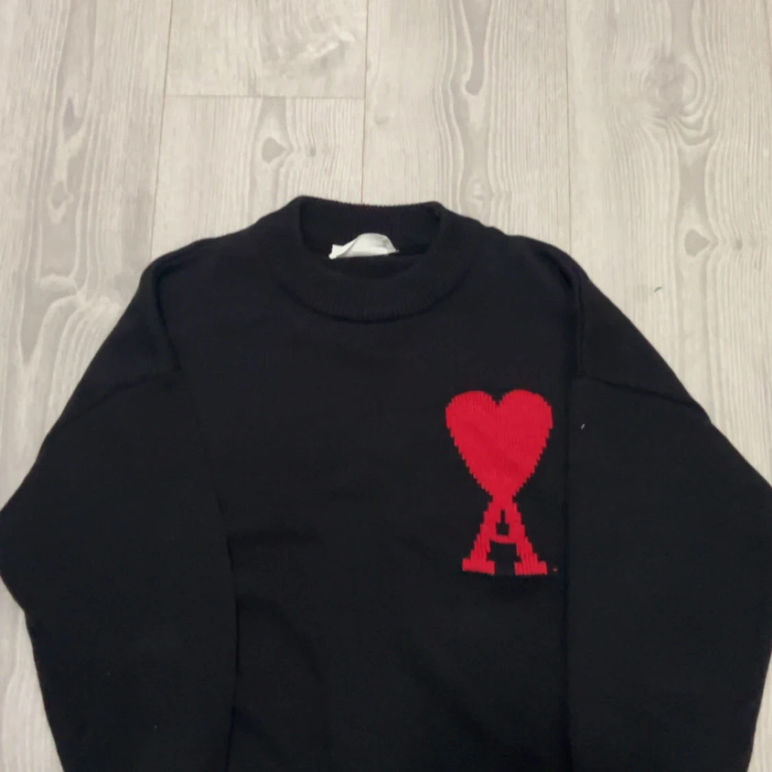 Svart stickad tröja från Ami