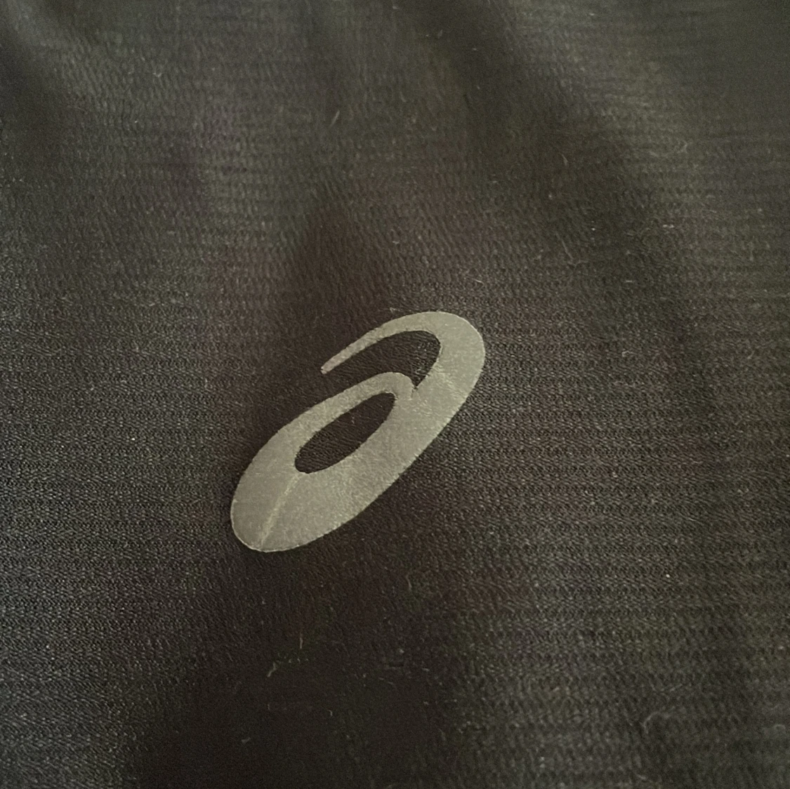 Svart träningst-shirt från Asics XS - 1