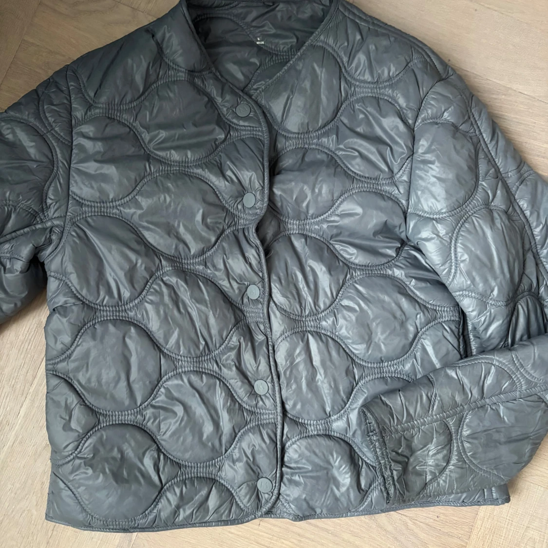 Grå quiltad pufferjacka XS - 1