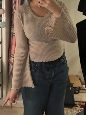 Flare beige shirt - Have worn a few times, it’s a year old but no spots or anything.