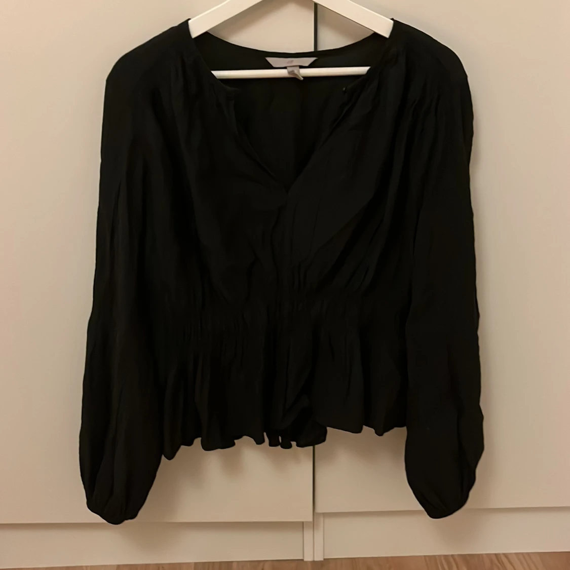 Svart blus från H&M stl M