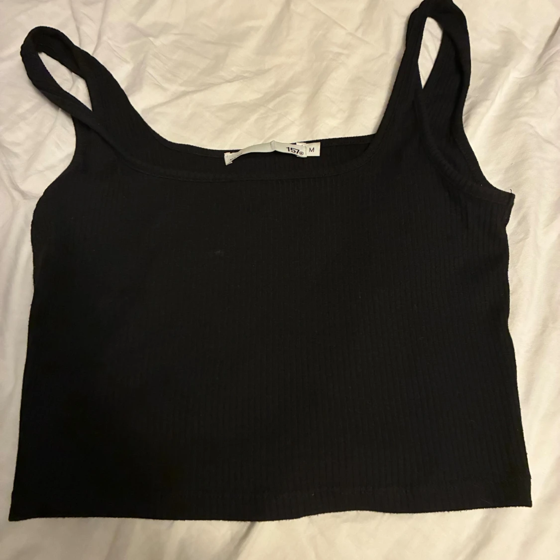 Svart ribbad linnetopp från 157