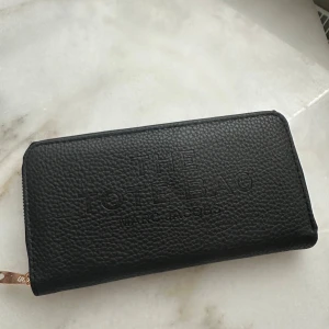 The tote bag - Fin liten handväska och ganska stilren. Aldrig kommit till användning 