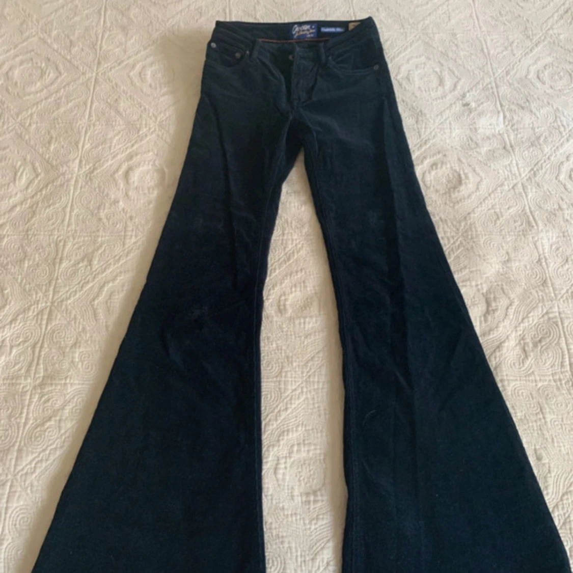 Mörkblå manchester Pow Flare byxor Crocker