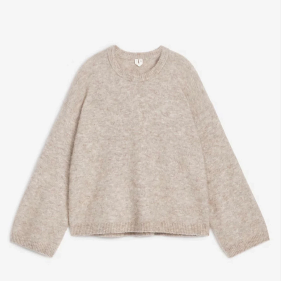 Beige stickad tröja från Arket