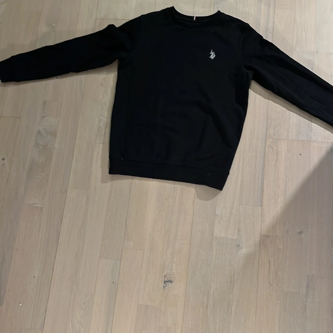 Svart sweatshirt från U.S. Polo Assn.