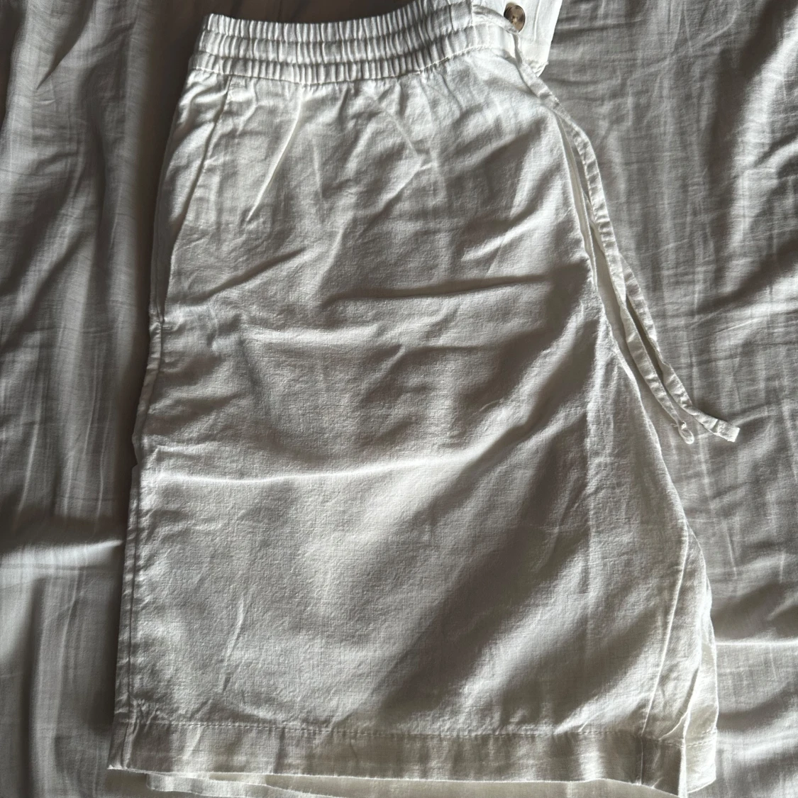Oanvända linne shorts 