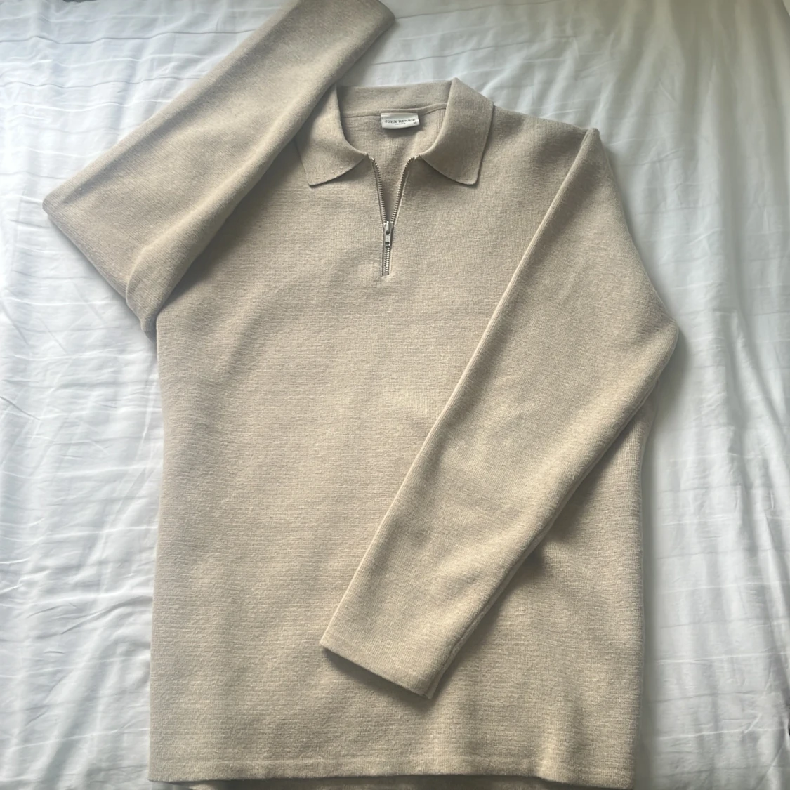 Beige stickad half zip från John Henric